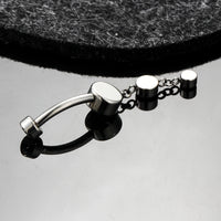 Elegância em Cascata com Pedra de Luz para Umbigo em Titânio G23